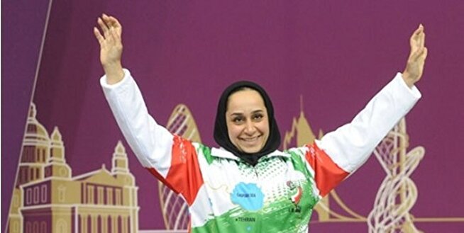 - شاهکار زن ایرانی در حمایت از کودکان غزه روی سکوی قهرمانی را ببینید